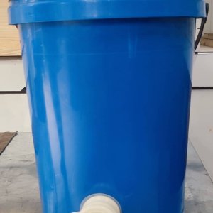 Bucket with honey gate